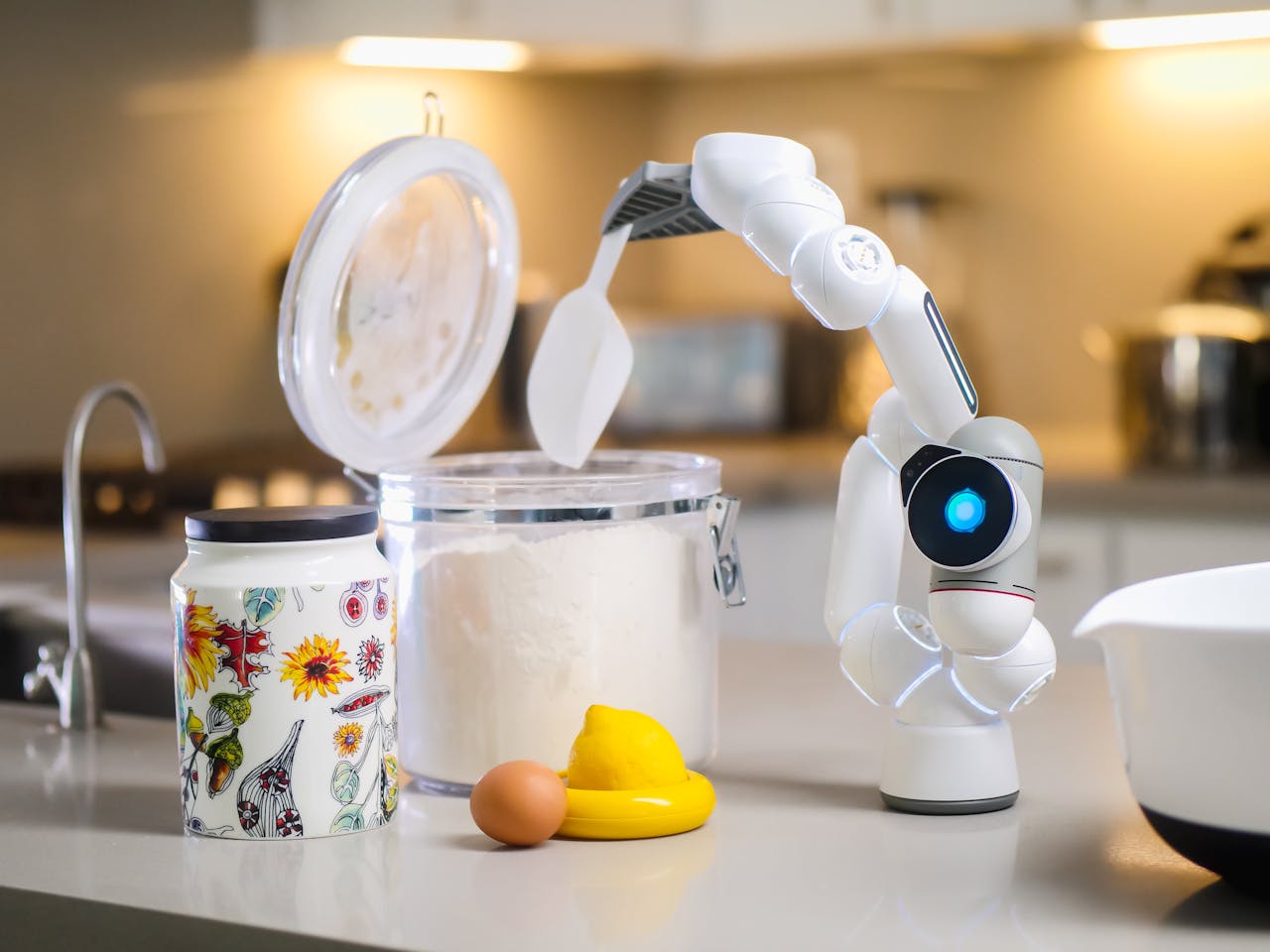 Crafting Captivating Headlines: Your awesome post title goes here A robotic arm measuring flour on a modern kitchen counter, highlighting innovation in technology.